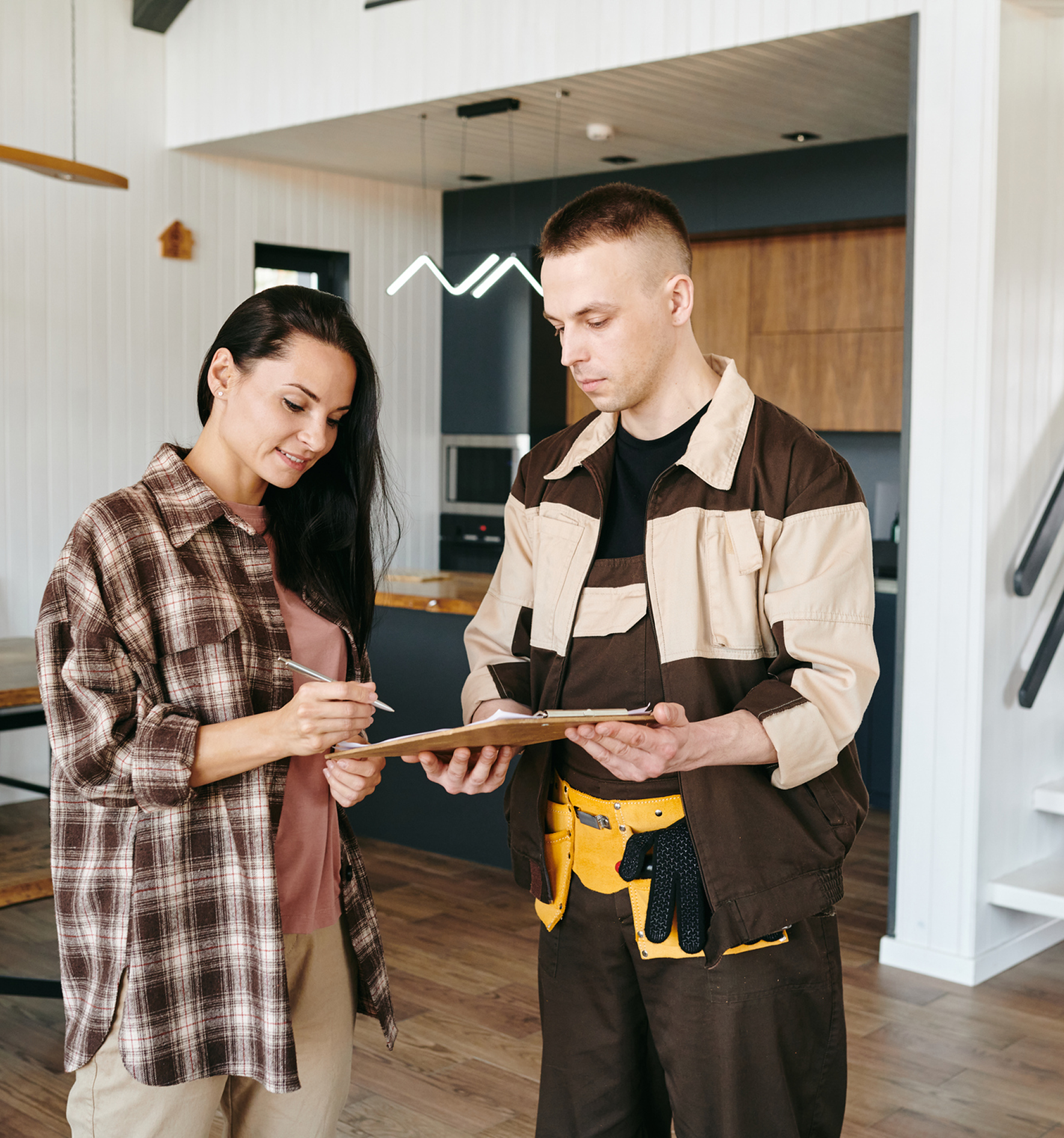 Customer discusses project with handyman